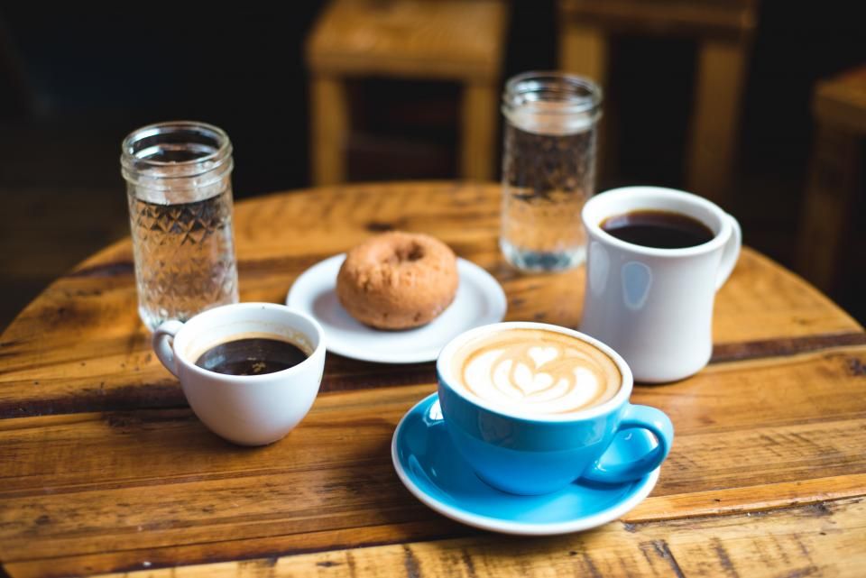 Pastries and coffee on the counter