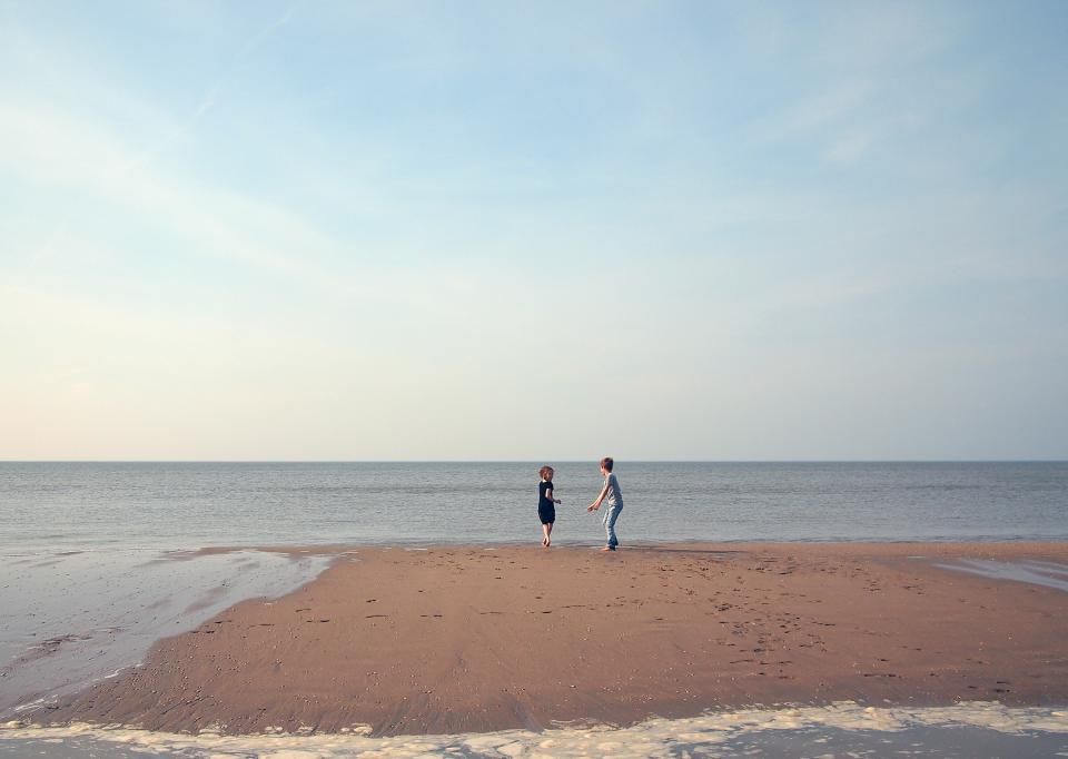 The beach and the water beyond it